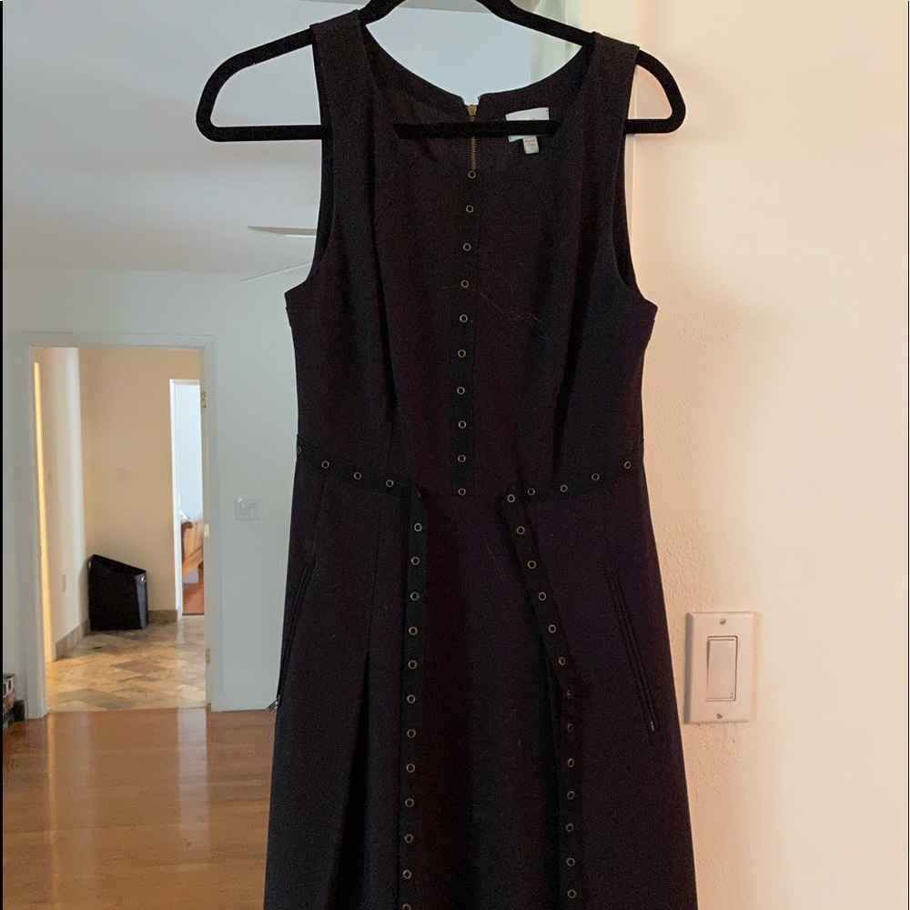 Black dress, with eyelet type shapes lining